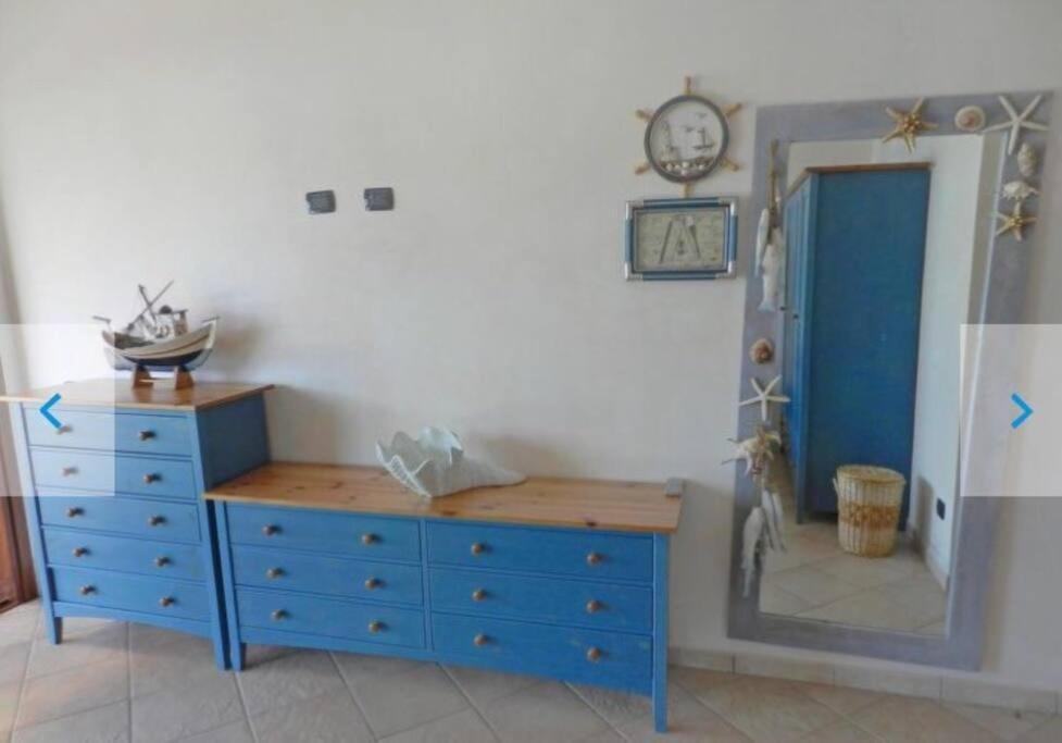 Apartment Pied Dans L'Eau Golfo Aranci Bagian luar foto